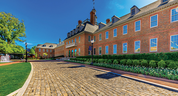 Ruppert used reclaimed cobblestone to fit the new grade on this site. According to the contractor, crews spent more than 600 hours cleaning and resetting them. (Photo: Ruppert Landscape)