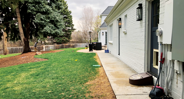 Another before photo gives a better look at the sloped backyard. (Photos: Designs by Sundown)