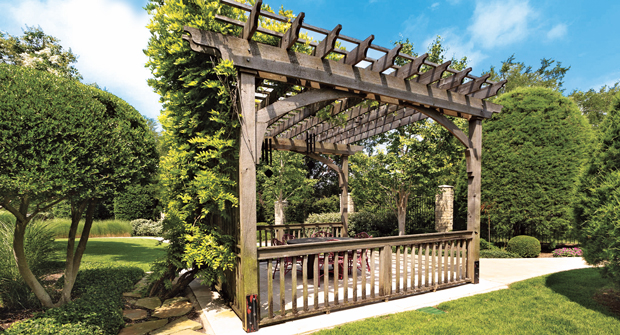 The wisteria covered gazebo is carefully maintained to avoid wood damage. Blooming can be enjoyed in the spring from the upper terrace and the sitting area in the gazebo. (Photo: Southern Botanical)