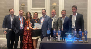 In an emotional moment, Teri Bruner, widow of Brodie Bruner, along with her daughter Brooklynn, were honored by McFarlin Stanford and The Grow Group with the Lifetime Supplier Award, for all the positive work Brodie did for the industry on behalf of Weathermatic. (Photo: McFarlin Stanford)