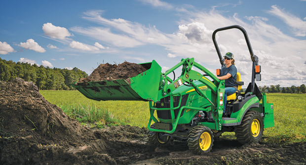 A compact utility tractor’s small size doesn’t stop it from moving big loads on a job site. (Photo: John Deere)