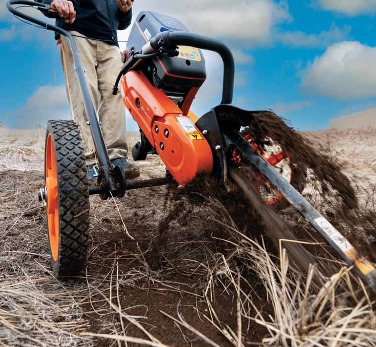 Handheld trenchers can be used with a small cart for maximum stability and precision. (Photo: GeoTrencher)