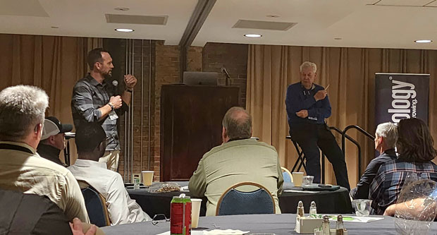 John Perry and Jim Turner, founder of Numerator Technologies, have an open discussion with attendees. Photo: LM Staff