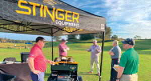 The team from Stinger Equipment showed off their product line in the outdoor demo area at the LM Growth Summit. (Photo: LM staff)