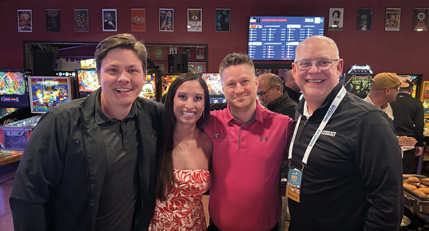 Pinball wizards: Hollister joined (from left) Rush Feldhacker, Kelly Dowell (second from left) and Weathermatic’s Gage Roberts at SmartCon. (Photo: LM staff)