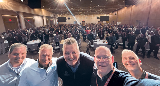 Selfie time! During one of the main stage presentations at GROW! 2025, Hollister and Roddy had the chance to grab a selfie with (from left) James Cali from McFarlin Stanford, Marty Grunder of The Grow Group and Gene Freeman with Complete Landsculpture — which will host the tour during next year’s GROW! event in Dallas — along with 1,000 of their closest friends.(Photo: LM staff)
