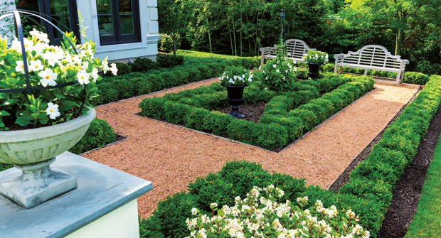 A view of the southside gardens shows off the manicured short boxwood hedges. (Photo: David J. Frank Landscape Contracting)