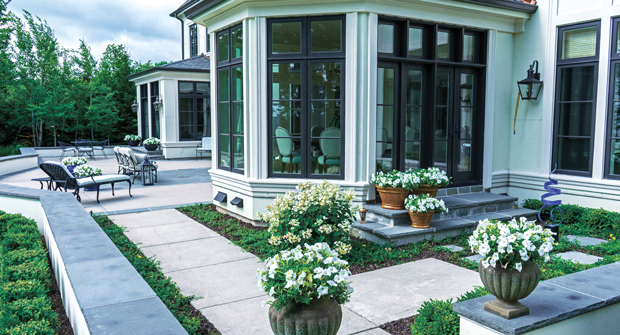 As part of a large outdoor wedding the homeowner hosted, David J. Frank installed white begonias throughout the property. (Photo: David J. Frank Landscape Contracting)