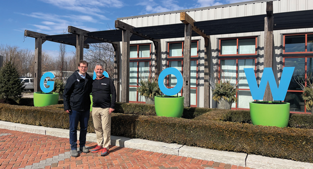 Signs of GROW-th The team at Hidden Creek Landscaping welcomed GROW! 2025 attendees with this custom sign that Roddy and The Grow Group’s Vince Torchia (left) used as a backstop for this photo during the tour of the company cofounded by Jason Cromley. (Photo: LM staff)