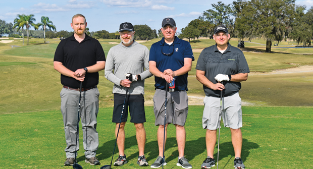 Direct competition: LM Editorial Director Seth Jones (second from right) and his golf partners at the LM Growth Summit: (from left) Christopher Lemaster with Turf Masters Brand, Cal Hill with Quali-Pro and Matt Smith with Steel Green. (Photo: LM staff)