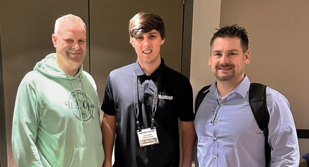 Triple trouble: LM’s associate editor Nathan Mader (center) chatted with Ben Molitor (right) with Best Lawn Care and Jesse Smith with Royal Greens at Lawncology. (Photo: LM staff)