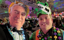Go Gators! Jones and James Cali, principal, McFarlin Stanford. Cali has been riding on the “Bacchagator” float for years. His job? To spread cheer and toss beads to the crowd while dressed as an alligator.