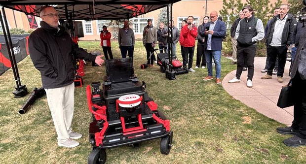 Todd Zimmerman, the vice president of product development for Kress, with the 40-inch cut and go autonomous mower. (Photo: LM Staff)