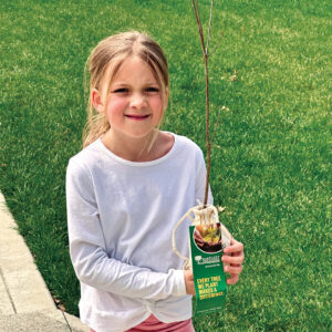 School days Sarah Roddy, the adorable daughter of LM’s very own Bill Roddy, now has her own connection to the landscaping industry thanks to the folks from Bartlett Tree Experts, who provided saplings to Sarah and her classmates at a school event. (Photo: LM staff)