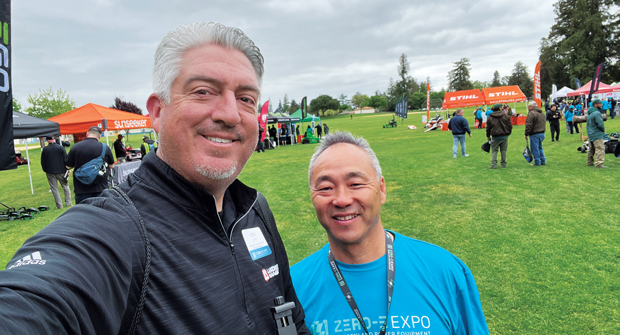 Electric avenue: Landscape Management’s Seth Jones grabbed a photo with Richard Ogawa of Gardenland Power Equipment and Towa industries during a visit to Northern California for the annual Zero-E Expo, which showcased the latest battery-powered and robotic products. (Photo: LM staff)