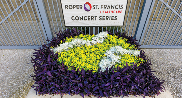 The tennis ball flower bed, created using spiderwort, dusty miller and duranta, is one of Vaughn’s favorite details at the stadium, and he says it’s a great feeling to install fun ideas that align with the client’s vision. (Photo: Ruppert Landscape)