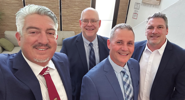 They clean up nice: At the TOCA meetings, the guys from LM — (from left) Jones, Hollister, Roddy and MacGregor — got all dressed up for the association’s awards banquet. (Photo: LM staff)