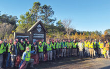 Community service projects like this lake clean-up effort last year are part of the culture at Bland Landscaping. (Photo: bland landscaping)