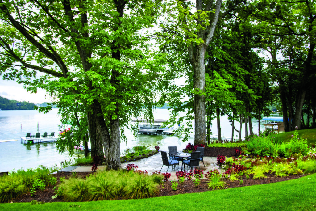 The lakeside was redone with native plants and a private boating dock. Majerus says all rainwater from the property is filtered through a wetland before entering the lake, preserving the natural ecosystem. (Photo: Sirna Productions and Patrick Hughes)