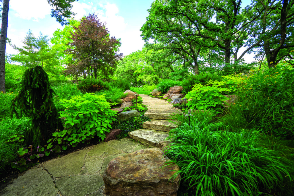An old footpath existed that was unsafe for walking, so the renovations connected the property with new stone stairs and paths. (Photo: Tony Soluri)