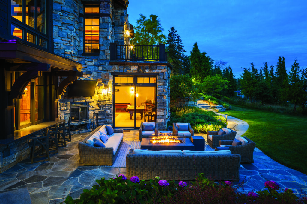 Patios with plenty of seating, a fireplace and outdoor bar were all important for creating a comfortable outdoor environment. (Photo: Chris Major)