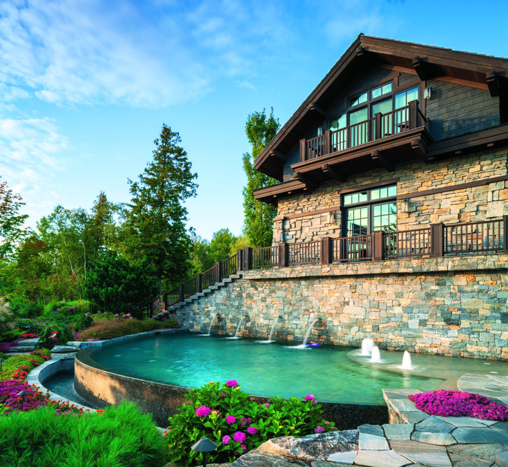 Privacy was key for the owners, so various walls, trees and other design elements were incorporated around the pool and backyard to ensure the clients could enjoy their new home in peace. (Photo: Chris Major)