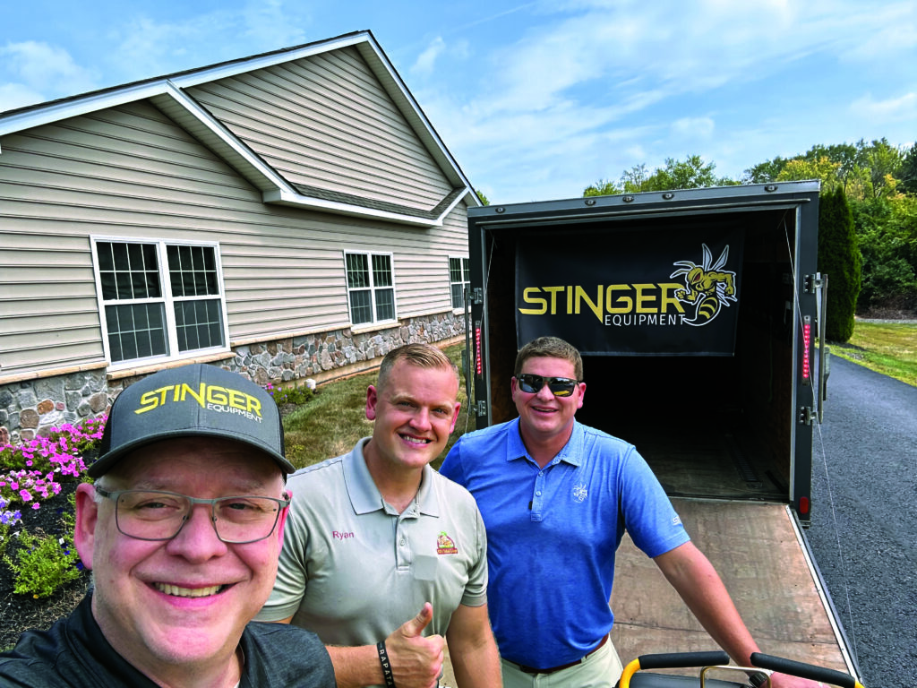 Sting like a bee LM Editor-in-Chief Scott Hollister (left) joined Ryan Dittes (center), owner of RD’s Total Lawn in Langhorne, Pa., and Dustin McGehee, VP of sales and marketing for Stinger, as Stinger presented Dittes with a new GT30 aerator through an effort to support emerging lawn care companies that will be chronicled in the pages of LM. (Photo: LM staff)
