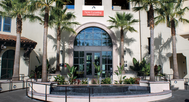 1. Past the main entrance at Springline, the campus is filled with apartments, a pool, courtyards, a shopping center and businesses, all with their own trees, flower beds, raised planters and turf areas to maintain. (Photo: Chelsea Aiello)