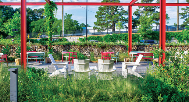 Repurposed steel and materials from the site have found a new life as trellises, benches, artistic pieces, swings and more. (Photo: Myatt Landscaping and Construction)