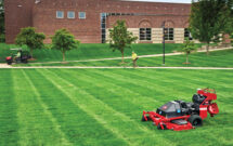 A team player Autonomous mowers can now travel between sites, allowing them to work alongside crew members and boost efficiency. (Photo: The Toro Co.)