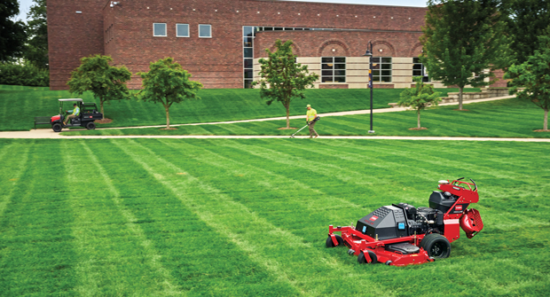 A team player Autonomous mowers can now travel between sites, allowing them to work alongside crew members and boost efficiency. (Photo: The Toro Co.)