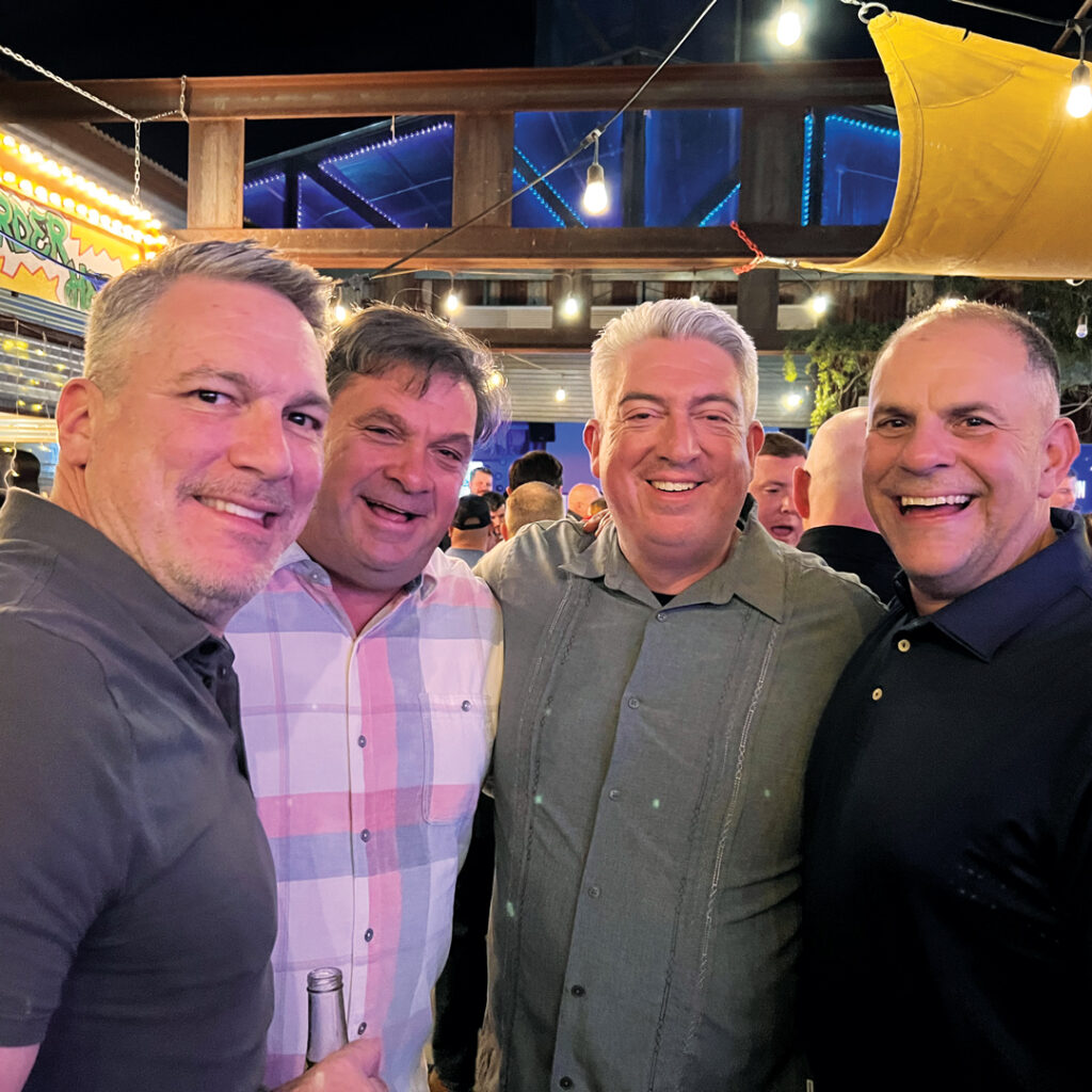 Friendly faces: We ran into LM editorial advisory board member Chris Joyce, Joyce Landscaping, Cape Cod, Mass., at the opening night reception at Elevate. Joining Joyce are MacGregor, Jones and Stoltman. (Photo: LM staff)