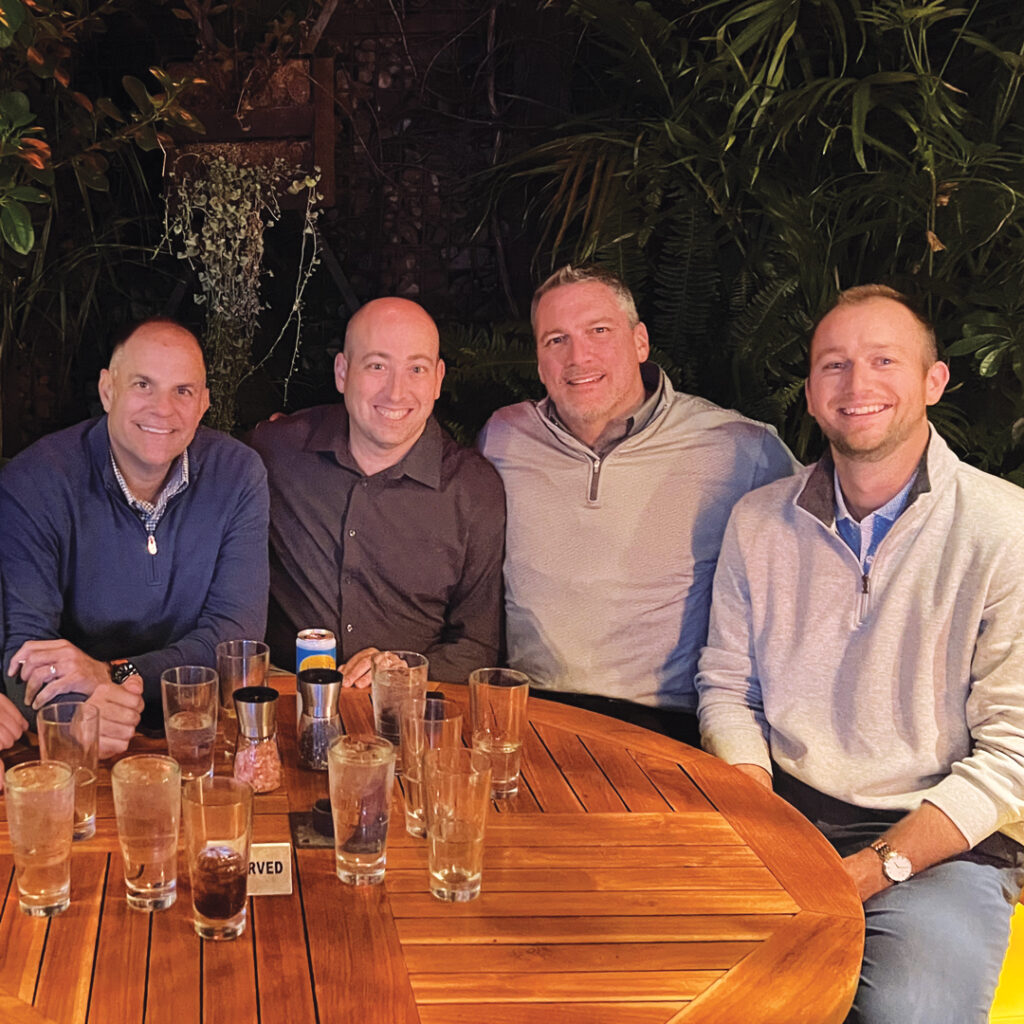 Do you guys sell medical equipment?: That was the question asked of this group. Maybe they sell medical equipment for the turf industry? From left to right are Kevin Stoltman, McCloskey and MacGregor with Quali-Pro’s Ryan Karapas. (Photo: LM staff)