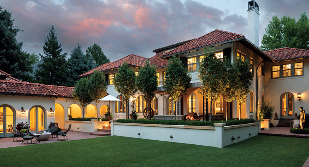 Jack Pear trees and large shade trees were planted for privacy, and the backyard uses synthetic turf for easy maintenance. (Photo: Kimberly Gavin Photography)