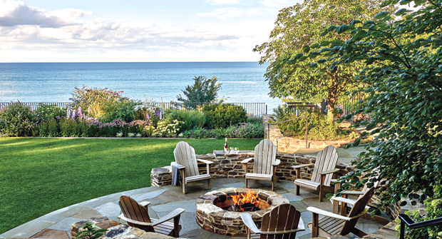 Elevation changes were better emphasized with the terraces, and a fire circle now anchors the south end of the middle lawn section. (Photo: Mariani Landscape)