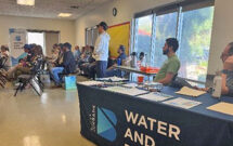 AGZA Founder Dan Mabe, holding a TOWA PDM, provided case studies on charging infrastructure needs and challenges. Photo: AGZA