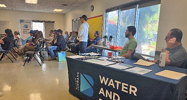 AGZA Founder Dan Mabe, holding a TOWA PDM, provided case studies on charging infrastructure needs and challenges. Photo: AGZA