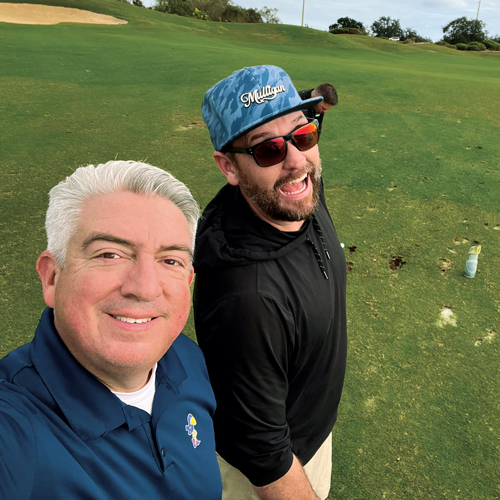 Practice makes perfect: LM’s Editorial Director Seth Jones (left) snapped a selfie with John Perry, president of Greene County Fertilizer Co., on the driving range before the golf outing at the LM Growth Summit. (Photo: LM staff)