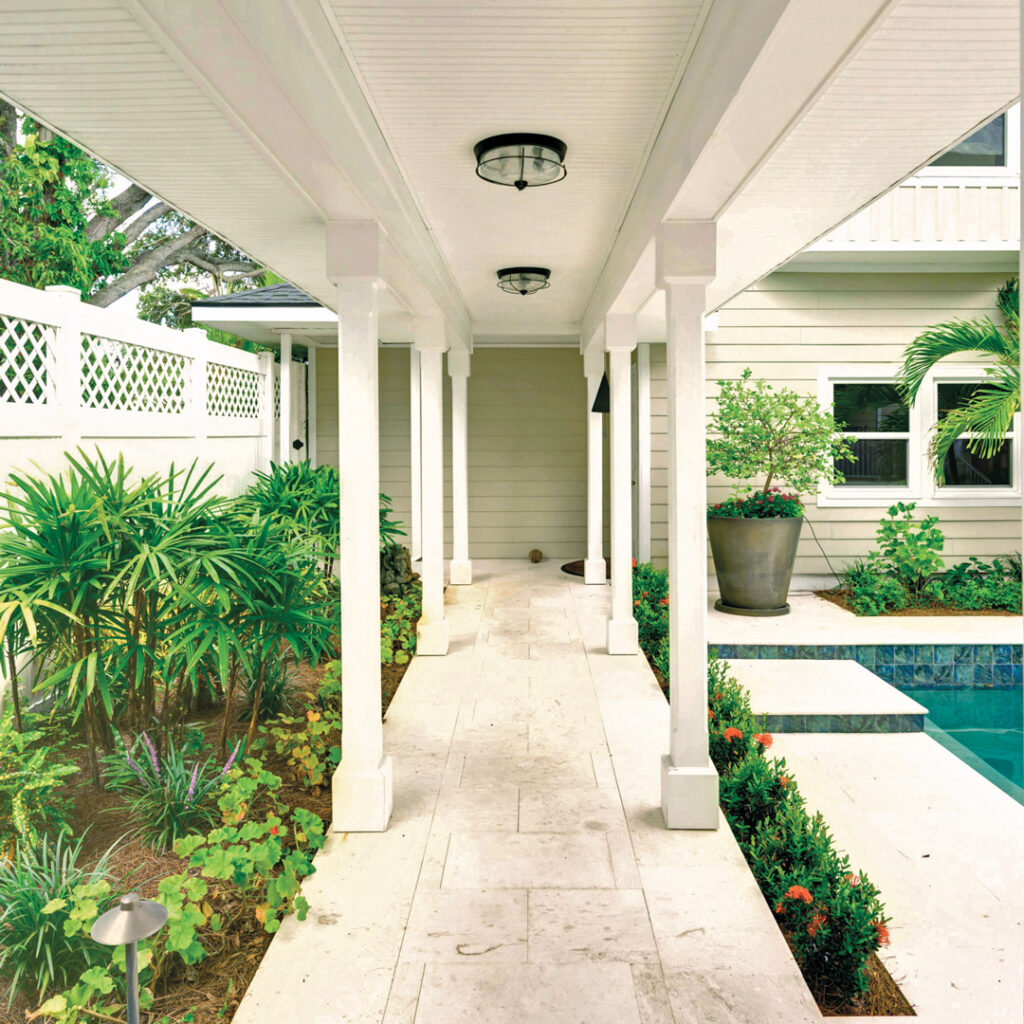 A new connecting covered patio was installed from the garage and guest residence to the main house. (Photo: Landscapes by Randy Lee)