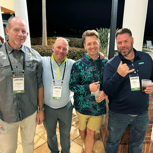 Expanding networks: The LM Growth Summit benefited the event’s partners as much as it did the lawn care operators in attendance. Pictured from left are Jeremy King, Kevin Lewis and Jason Hinkley — all with Ewing Outdoor Supply — joined Brad Hendrickson from Turfco for a quick photo during one of the evening receptions. (Photo: LM staff)