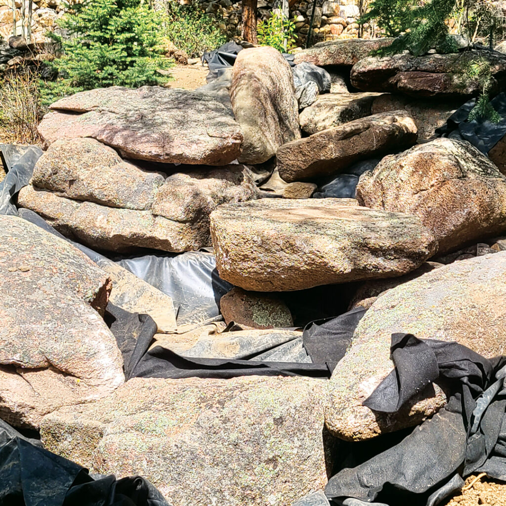 About 40 tons of landscape boulders were brought up the mountain for the High Mountain Haven project. (Photo: Alpine Gardens)