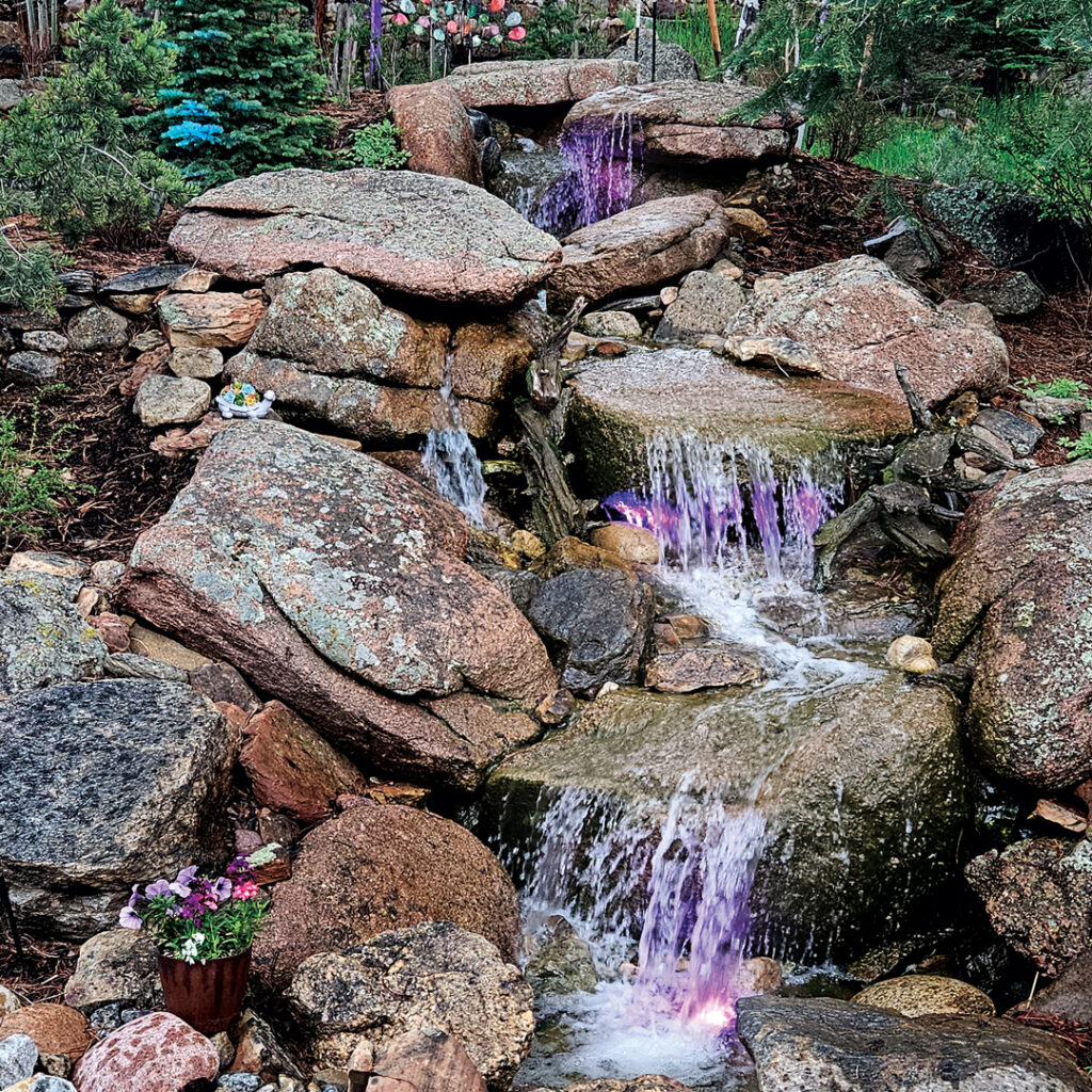The project’s primary water feature was this recirculating rock waterfall and stream system which was designed to mimic natural mountain runoff. (Photo: Alpine Gardens)