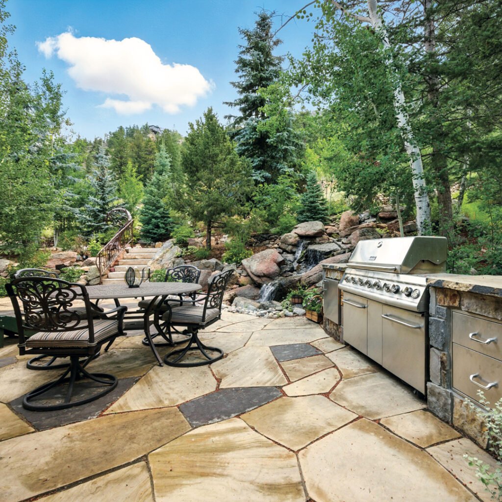 An outdoor kitchen was the highlight of extensive hardscape work on the High Mountain Haven project. “We wanted to create an area of relaxation, a place that (the owners) can hang out, that they can just enjoy the space and the Colorado mountains,” says Vannest. (Photo: Alpine Gardens)