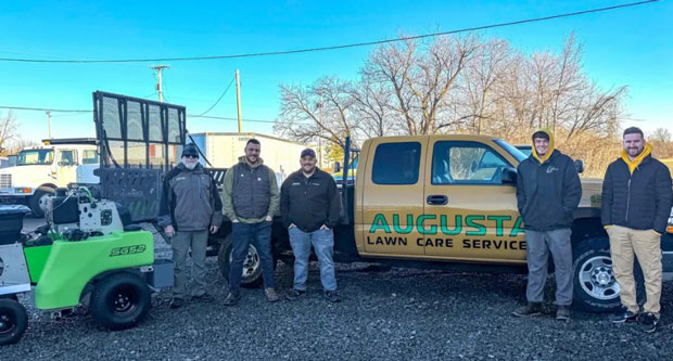 The machine was delivered by (pictured from left to right) Steel Green Manufacturing’s Scot Jones, Advanced Turf Solutions’ Jordan Mansfield and Steel Green Manufacturing’s Kodi Quinlisk. (Photo: Advanced Turf Solutions, Corteva, Steel Green)