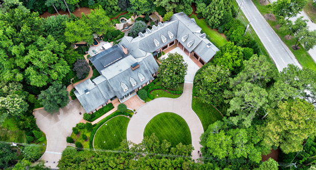 Almost all maintenance is done by hand, including deadheading, mulching and more. The team also mows the property, and maintenance takes about half a day on-site. (Photo: Myatt Landscaping and Construction)