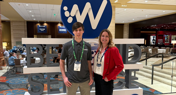 Service with a smile: At WorkWave’s annual user conference, Beyond Service, LM‘s Nathan Mader was on hand to report on all the action, including a photo opportunity with WorkWave’s Aimee Rametta. (Photo: LM staff)