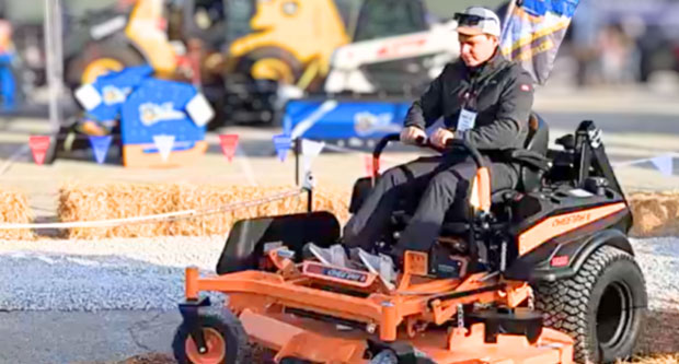 A showgoer test drives the SCAG Cheetah equipped with Goodyear Softrac Pro and Softrac Smooth tires. Photo: Titan