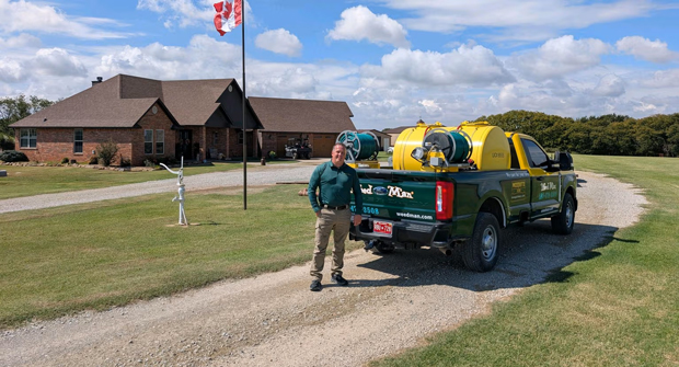 Kimmell got started with Weed Man in 2010, and more than a decade later, he’s back to servicing yards under the franchise’s name. (Photo: Weed Man)