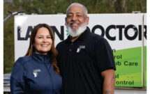 After a 24-year military career, Valle (shown here with his wife, Lara) invested in a Lawn Doctor franchise. (Photo: David Steele)